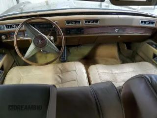 1976 Cadillac Eldorado z VIN 6L67S6Q235270, wystawiony jako Copart lot #80518554 z przebiegiem 4 944 mil mil oraz Szkoda całkowita • Salvage title. Historia ofert i sprzedaży dostępna na DreamBid. Obrazek 8.