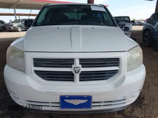 2008 Dodge Caliber SE with VIN 1B3HB28B38D656519, listed as a IAAI auction lot 42152064 with 209,292 mi miles. Bid and sale history available at carsss.com. Image 12.