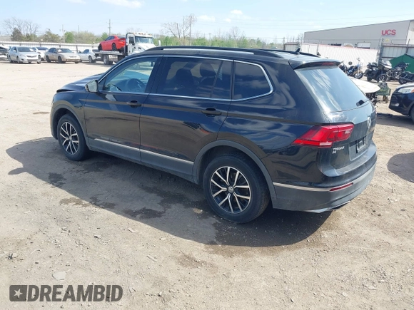 2021 Volkswagen Tiguan SE with VIN 3VV3B7AX3MM157702, listed as a IAAI auction lot 41888479 with 51,807 mi miles and . Bid and sale history available at DreamBid. Image 3.