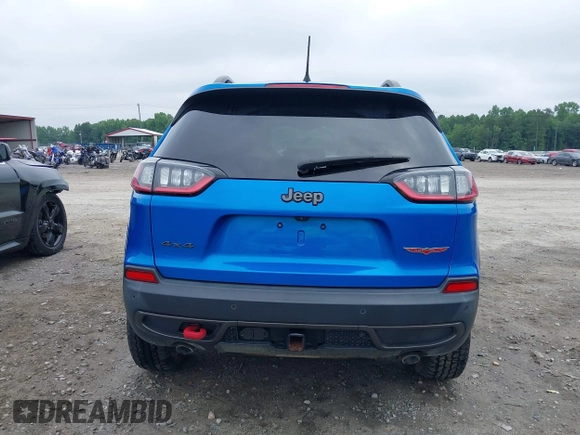 2019 Jeep Cherokee Trailhawk with VIN 1C4PJMBX0KD141577, listed as a IAAI auction lot 42413454 with 122,386 mi miles and . Bid and sale history available at DreamBid. Image 16.