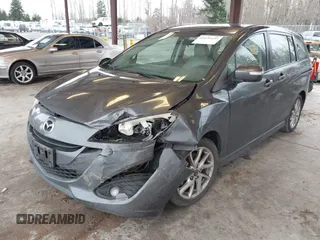 2014 Mazda 5 Touring with VIN JM1CW2CL7E0167945, listed as a IAAI auction lot 41624435 with 167,736 mi miles. Bid and sale history available at carsss.com. Image 17.