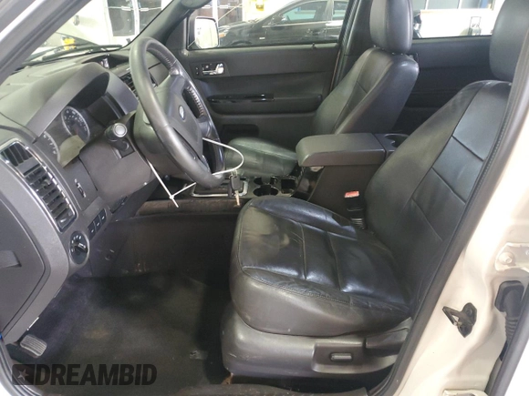 2010 Ford Escape Limited z VIN 1FMCU9EG4AKC43050, wystawiony jako Copart lot #60251495 z przebiegiem 174 550 mil mil oraz Szkoda całkowita • Salvage title. Historia ofert i sprzedaży dostępna na DreamBid. Obrazek 7.