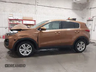 2018 Kia Sportage LX with VIN KNDPMCAC9J7403108, listed as a IAAI auction lot 41946497 with 123,023 mi miles. Bid and sale history available at carsss.com. Image 15.
