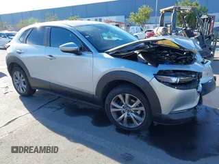 2021 Mazda CX-30 Select with VIN 3MVDMABL9MM256321, listed as a IAAI auction lot 41057613 with Not Provided miles and . Bid and sale history available at DreamBid. Image 1.
