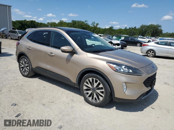 2020 Ford Escape Titanium Hybrid with VIN 1FMCU0DZXLUA07024, listed as a Copart auction lot 61547795 with 36,965 mi miles and Salvage title. Bid and sale history available at DreamBid. Image 4.