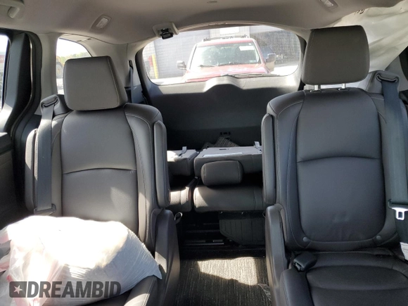 2023 Honda Odyssey Touring with VIN 5FNRL6H89PB034171, listed as a Copart auction lot 55039095 with Not Provided miles and Salvage Title. Bid and sale history available at DreamBid. Image 10.