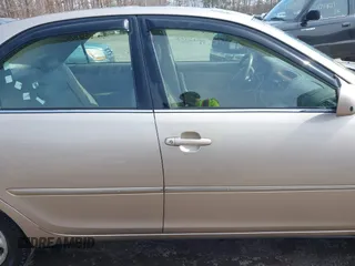 2004 Toyota Camry LE with VIN 4T1BF30K94U587836, listed as a IAAI auction lot 41714277 with 211,893 mi miles and . Bid and sale history available at carsss.com. Image 13.
