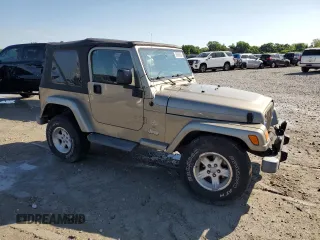 2004 Jeep Wrangler Sahara with VIN 1J4FA59S14P755450, listed as a Copart auction lot 58558005 with 194,044 mi miles and Salvage title. Bid and sale history available at DreamBid. Image 4.