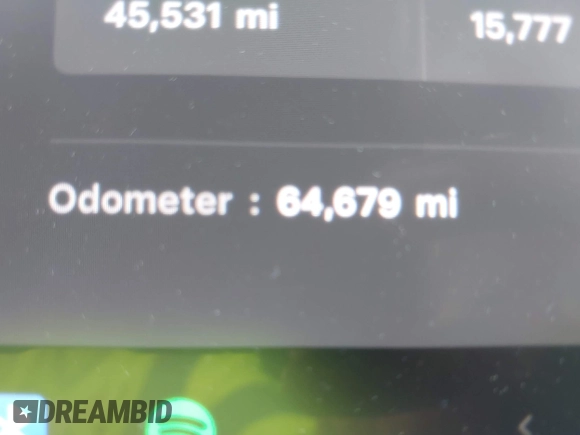 2021 Tesla Model Y Performance with VIN 5YJYGDEF9MF081798, listed as a IAAI auction lot 42033358 with 64,679 mi miles and . Bid and sale history available at DreamBid. Image 16.