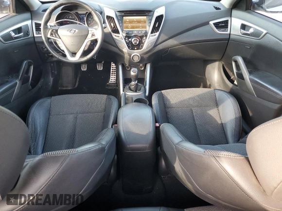 2013 Hyundai Veloster w/Gray Int with VIN KMHTC6ADXDU130886, listed as a Copart auction lot 57478095 with 130,008 mi miles and Salvage title. Bid and sale history available at DreamBid. Image 8.