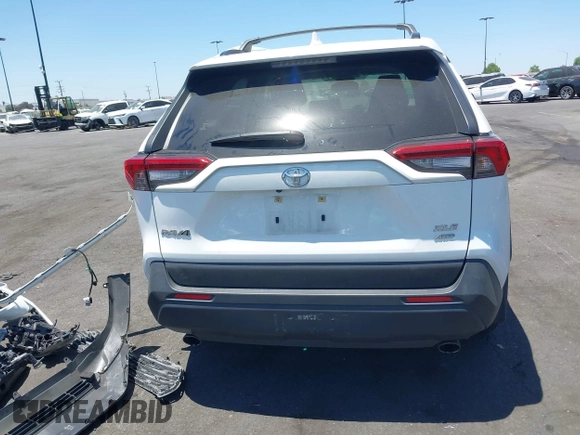 2019 Toyota RAV4 XLE with VIN JTMP1RFV8KD025971, listed as a IAAI auction lot 42673361 with 69,241 mi miles and . Bid and sale history available at DreamBid. Image 17.