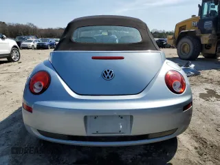 2010 Volkswagen Beetle with VIN 3VWRG3AL9AM005948, listed as a Copart auction lot 48319665 with 70,838 mi miles and Salvage Title. Bid and sale history available at DreamBid. Image 6.