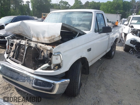 1995 Ford F-150 z VIN 1FTDF15Y2SLA09272, wystawiony jako IAAI lot #42292685 z przebiegiem 179 813 mil mil oraz . Historia ofert i sprzedaży dostępna na DreamBid. Obrazek 2.