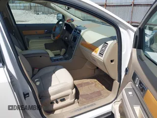 2007 Lincoln MKX with VIN 2LMDU88CX7BJ22585, listed as a IAAI auction lot 42061572 with 148,029 mi miles. Bid and sale history available at carsss.com. Image 5.