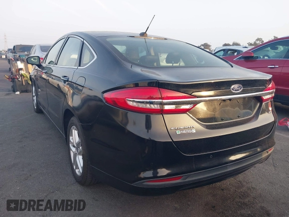 2018 Ford Fusion Energi SE with VIN 3FA6P0PU7JR232567, listed as a IAAI auction lot 41219232 with 54,049 mi miles. Bid and sale history available at carsss.com. Image 3.