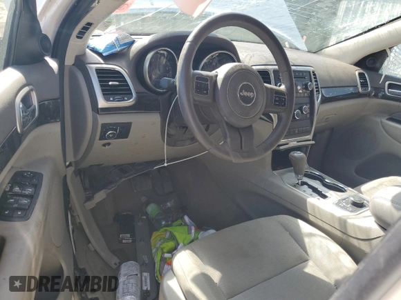 2011 Jeep Grand Cherokee Laredo with VIN 1J4RR4GG8BC724196, listed as a Copart auction lot 51760195 with 79,407 mi miles and Salvage Title. Bid and sale history available at DreamBid. Image 8.