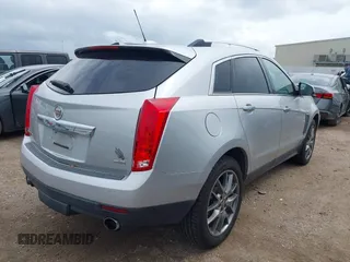2015 Cadillac SRX Performance Collection z VIN 3GYFNCE36FS633386, wystawiony jako IAAI lot #41851338 z przebiegiem 102 586 mil mil oraz . Historia ofert i sprzedaży dostępna na DreamBid. Obrazek 4.