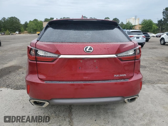 2016 Lexus RX 350 z VIN JTJBZMCA9G2001394, wystawiony jako Copart lot #56181355 z przebiegiem 106 161 mil mil oraz Szkoda całkowita • Salvage title. Historia ofert i sprzedaży dostępna na DreamBid. Obrazek 6.