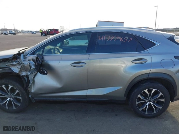 2015 Lexus NX 200t with VIN JTJBARBZ2F2002932, listed as a IAAI auction lot 41797857 with 205,902 mi miles. Bid and sale history available at carsss.com. Image 14.
