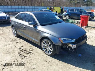 2016 Audi A3 Premium z VIN WAUA7GFF3G1036464, wystawiony jako IAAI lot #41637021 z przebiegiem 56 590 mil mil oraz . Historia ofert i sprzedaży dostępna na DreamBid. Obrazek 1.