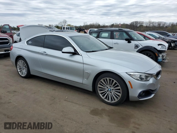 2016 BMW 4 Series 428i xDrive with VIN WBA3N9C56GK249666, listed as a Copart auction lot 53881285 with 140,031 mi miles and Salvage title. Bid and sale history available at DreamBid. Image 4.
