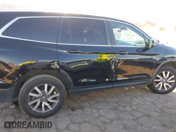 2021 Honda Pilot EX-L with VIN 5FNYF5H51MB004516, listed as a IAAI auction lot 41759992 with 75,476 mi miles. Bid and sale history available at carsss.com. Image 14.