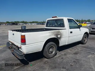 1994 Isuzu Pickup S z VIN JAACL11LXR7217702, wystawiony jako IAAI lot #41761090 z przebiegiem 198 468 mil mil oraz . Historia ofert i sprzedaży dostępna na DreamBid. Obrazek 4.