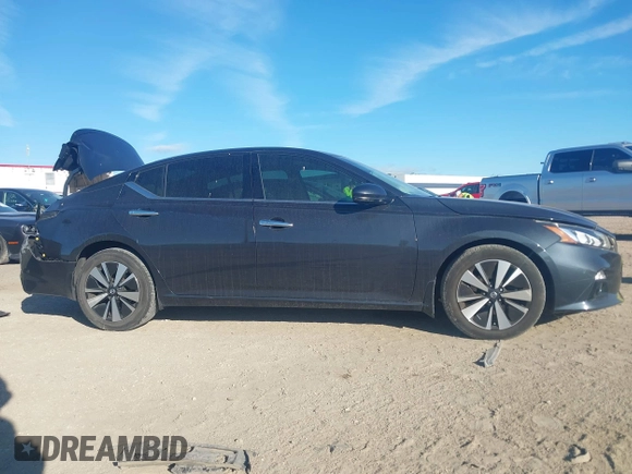 2019 Nissan Altima 2.5 SV with VIN 1N4BL4DV9KC117080, listed as a IAAI auction lot 41827686 with 84,228 mi miles. Bid and sale history available at carsss.com. Image 13.