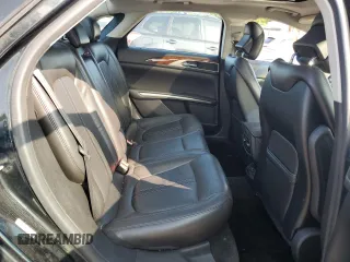 2014 Lincoln MKZ z VIN 3LN6L2J90ER802254, wystawiony jako Copart lot #58727025 z przebiegiem 172 297 mil mil oraz Szkoda całkowita • Salvage title. Historia ofert i sprzedaży dostępna na DreamBid. Obrazek 10.