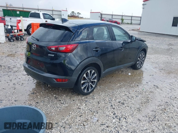 2019 Mazda CX-3 Touring with VIN JM1DKDC76K1406860, listed as a IAAI auction lot 40767122 with 162,636 mi miles. Bid and sale history available at carsss.com. Image 4.