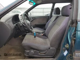 1996 Subaru Legacy Outback with VIN 4S3BG6858T7974280, listed as a Copart auction lot 78790874 with 290,480 mi miles and Salvage title. Bid and sale history available at DreamBid. Image 7.