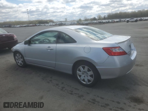 2010 Honda Civic Cpe LX with VIN 2HGFG1B65AH530525, listed as a Copart auction lot 53235325 with 156,429 mi miles and Salvage Title. Bid and sale history available at carsss.com. Image 2.