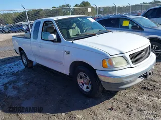 2003 Ford F-150 XL with VIN 1FTRX17W93NB66494, listed as a IAAI auction lot 41451666 with 205,770 mi miles. Bid and sale history available at carsss.com. Image 1.