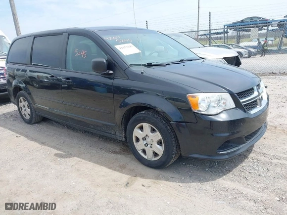 2012 Dodge Grand Caravan SE with VIN 2C4RDGBG2CR351999, listed as a IAAI auction lot 42075245 with 149,997 mi miles. Bid and sale history available at carsss.com. Image 1.