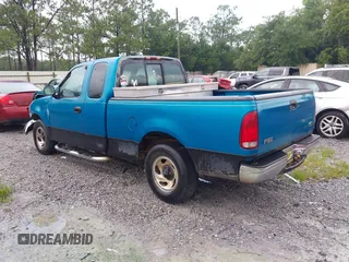 1998 Ford F-150 with VIN 1FTZX172XWNA93590, listed as a IAAI auction lot 42630006 with 180,178 mi miles and . Bid and sale history available at DreamBid. Image 3.