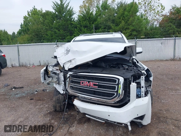 2019 GMC Yukon XL SLT with VIN 1GKS2GKC2KR369285, listed as a IAAI auction lot 40279008 with Not Provided miles and . Bid and sale history available at DreamBid. Image 12.