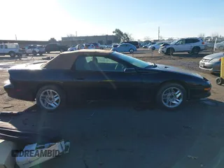 1996 Chevrolet Camaro Z28 z VIN 2G1FP32PXT2166409, wystawiony jako IAAI lot #41264761 z przebiegiem 143 820 mil mil oraz . Historia ofert i sprzedaży dostępna na DreamBid. Obrazek 13.