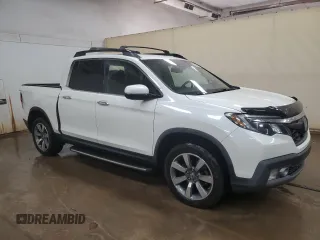 2018 Honda Ridgeline RTL-E with VIN 5FPYK3F74JB001049, listed as a Copart auction lot 57590075 with 111,848 mi miles and Clean title. Bid and sale history available at DreamBid. Image 4.