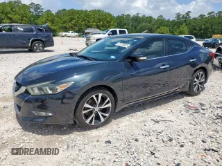 2016 Nissan Maxima SR with VIN 1N4AA6AP8GC439011, listed as a Copart auction lot 61019035 with 156,808 mi miles and Salvage title. Bid and sale history available at DreamBid. Image 1.