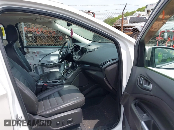 2016 Ford Escape Titanium with VIN 1FMCU9J92GUA71444, listed as a IAAI auction lot 42334603 with 79,780 mi miles and . Bid and sale history available at DreamBid. Image 5.