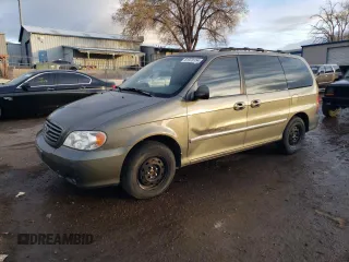 2003 Kia Sedona LX with VIN KNDUP131636359281, listed as a Copart auction lot 81978154 with 180,813 mi miles and Salvage Title. Bid and sale history available at carsss.com. Image 1.