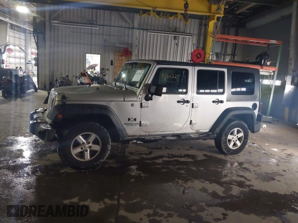 2007 Jeep Wrangler Unlimited X with VIN 1J4GA39167L147516, listed as a IAAI auction lot 41617025 with 119,572 mi miles and . Bid and sale history available at DreamBid. Image 15.