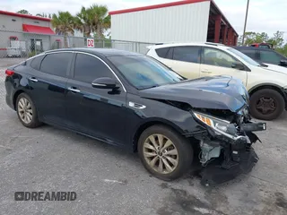 2018 Kia Optima LX z VIN 5XXGT4L33JG270472, wystawiony jako IAAI lot #42292416 z przebiegiem 60 064 mil mil oraz . Historia ofert i sprzedaży dostępna na DreamBid. Obrazek 1.