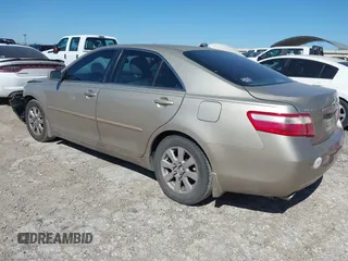 2009 Toyota Camry LE with VIN 4T1BK46K09U075169, listed as a IAAI auction lot 39169852 with 211,105 mi miles. Bid and sale history available at carsss.com. Image 3.