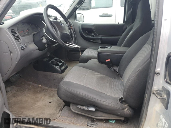 2003 Ford Ranger XL Fleet with VIN 1FTYR44V33TA25919, listed as a Copart auction lot 52086025 with 163,386 mi miles and Clean Title. Bid and sale history available at DreamBid. Image 7.