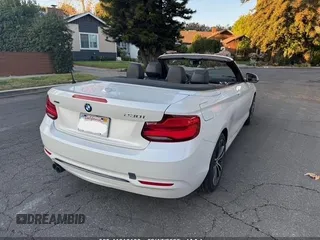 2018 BMW 2 Series 230i xDrive with VIN WBA2K1C55JVB64560, listed as a IAAI auction lot 41616166 with 69,414 mi miles. Bid and sale history available at carsss.com. Image 4.