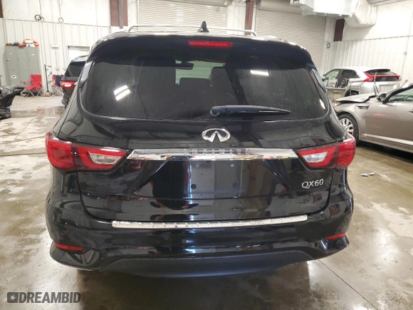 2016 Infiniti QX60 with VIN 5N1AL0MM6GC510169, listed as a Copart auction lot 86004324 with 63,210 mi miles and Salvage Title. Bid and sale history available at carsss.com. Image 6.
