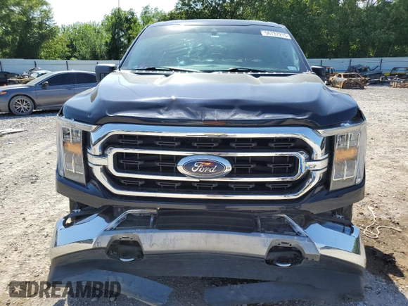 2021 Ford F-150 XL with VIN 1FTFW1E5XMFA47980, listed as a Copart auction lot 56737215 with 63,781 mi miles and Salvage title. Bid and sale history available at DreamBid. Image 5.