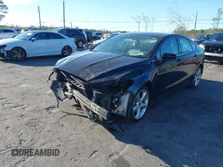 2016 Ford Fusion S with VIN 3FA6P0G70GR375847, listed as a IAAI auction lot 41818306 with 74,565 mi miles. Bid and sale history available at carsss.com. Image 2.