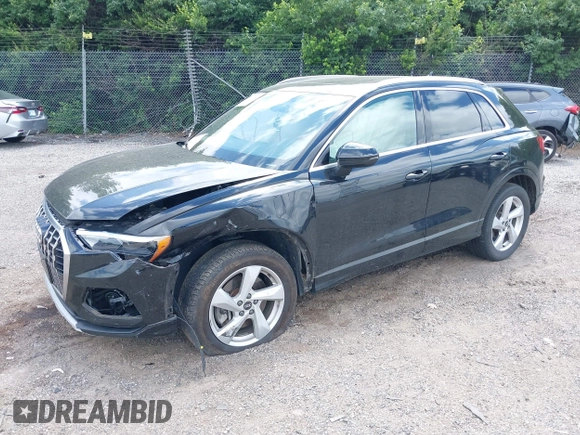 2022 Audi Q3 Premium with VIN WA1AUCF37N1031270, listed as a IAAI auction lot 42297083 with 36,620 mi miles and . Bid and sale history available at DreamBid. Image 2.